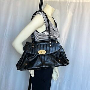 Cleo and Patek Paris leather purse